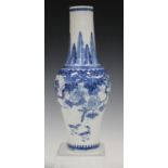 A Chinese blue and white porcelain vase, mark of Kangxi but late 19th century, the baluster body