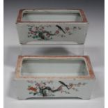 A pair of Chinese famille rose porcelain rectangular planters, late Qing dynasty, each painted