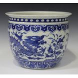 A Chinese blue and white porcelain jardiniere, probably late Qing dynasty, the body painted with two