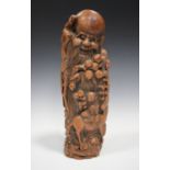 A Chinese carved bamboo figure of Shoulau, early 20th century, finely carved in relief, standing