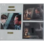AUTOGRAPHS. A colour photograph signed by Bruce Willis and Haley Joel Osment, 19.5cm x 24.5cm,