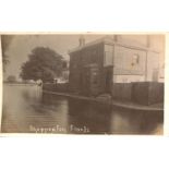 A collection of 12 postcards of the Shepperton floods, together with 5 postcard-size photographs