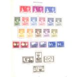A George VI Crown album of mint and used stamps, including Bahamas 1938 and 1942 sets to £1 mint,