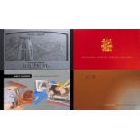 Three albums of Great Britain presentation packs, together with prestige booklets and year books
