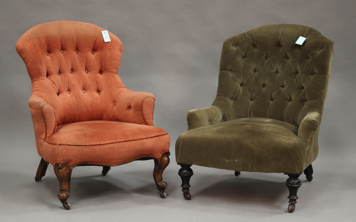 A mid-Victorian buttoned back armchair, upholstered in pink fabric, on carved cabriole walnut legs