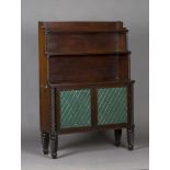 A George IV mahogany open waterfall bookcase cabinet, the galleried top above three open shelves and