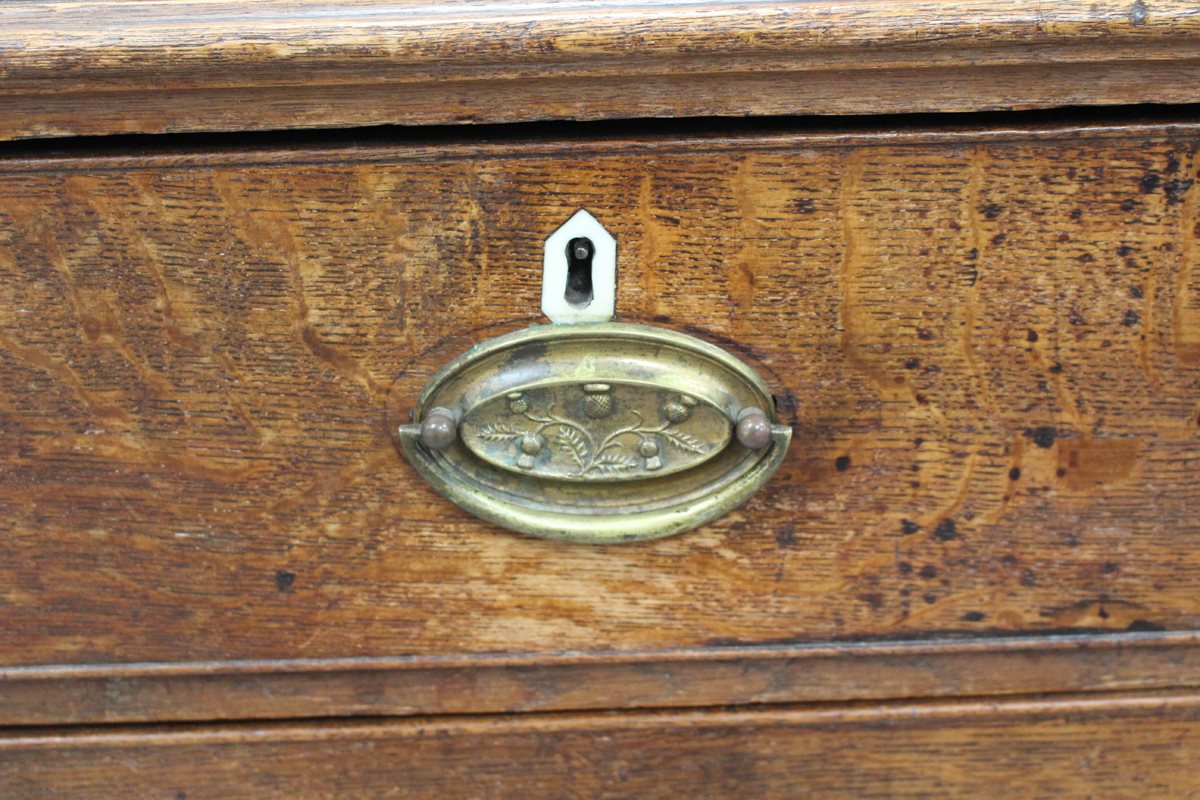 A George III oak chest of two short and three long drawers, on bracket feet, height 104cm, width - Image 2 of 3