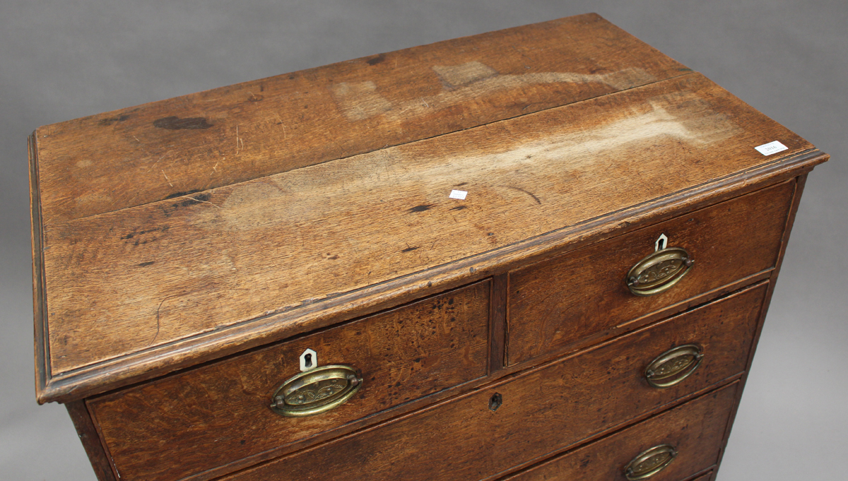 A George III oak chest of two short and three long drawers, on bracket feet, height 104cm, width - Image 3 of 3