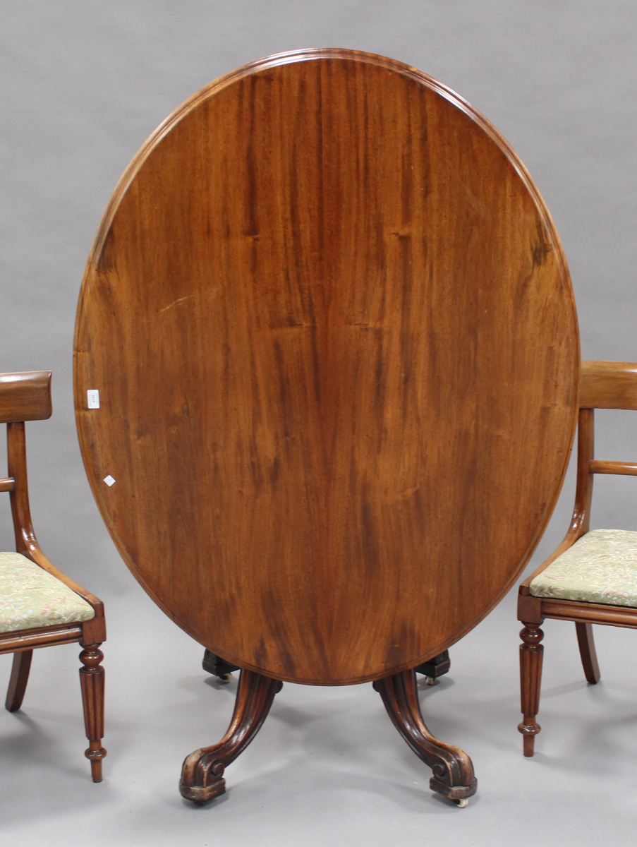 A late Victorian mahogany oval tip-top breakfast table, the turned stem on cabriole legs, height - Image 2 of 4