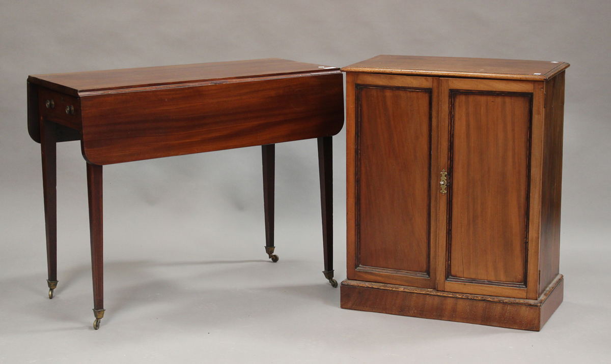 A late George III mahogany Pembroke table with boxwood line inlaid decoration, fitted with a