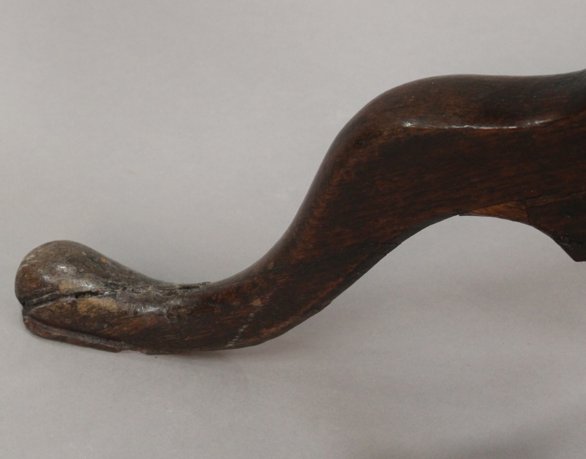 A late George III provincial oak circular tip-top wine table, raised on a turned baluster stem and - Image 3 of 4