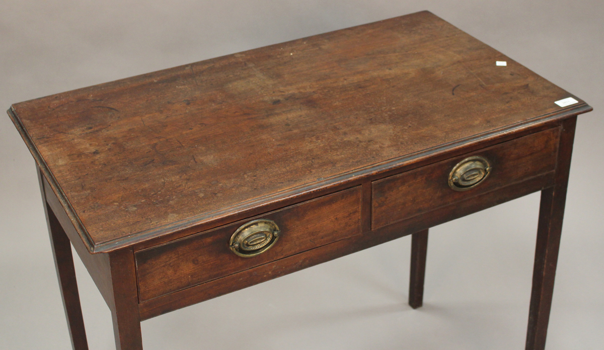 A George III mahogany side table, the moulded top above two frieze drawers, on square tapering legs, - Image 3 of 3