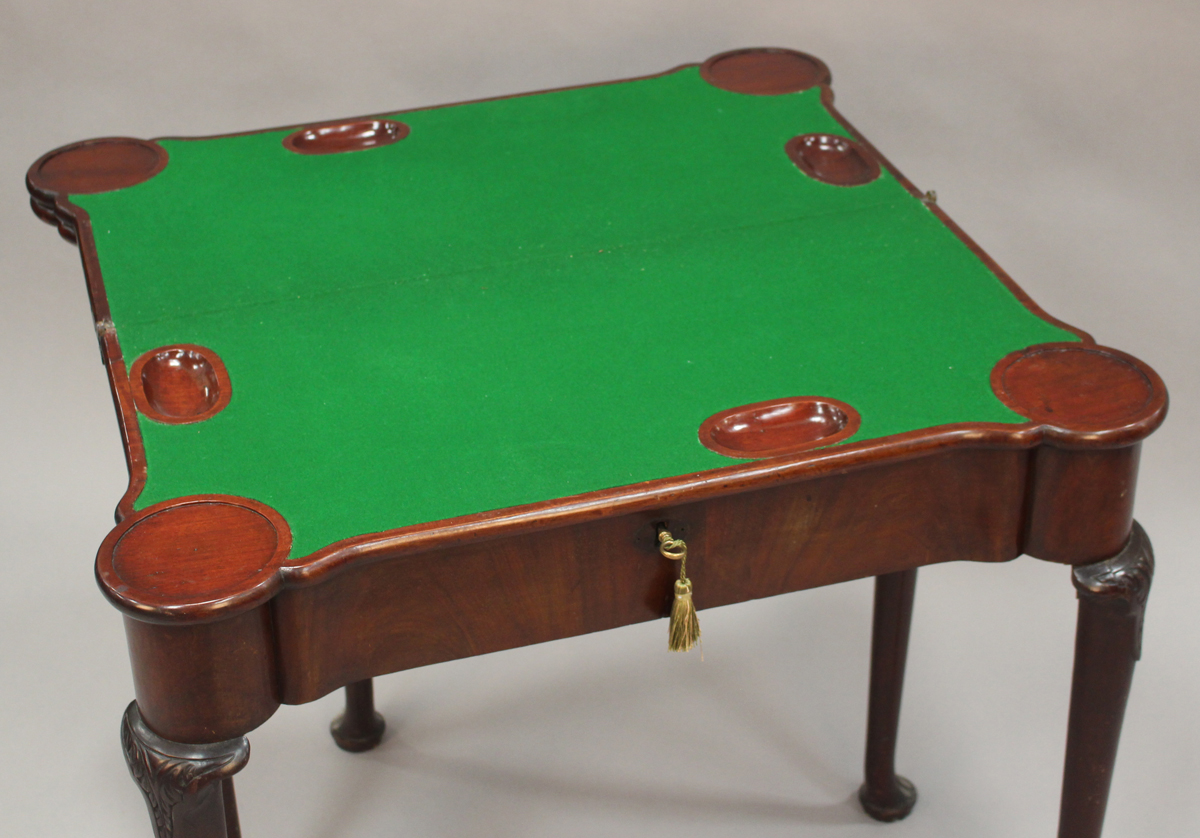 A George II mahogany triple leaf fold-over games and tea table, the hinged top with projecting - Image 4 of 8