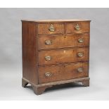 A George III oak chest of two short and three long drawers, on bracket feet, height 104cm, width