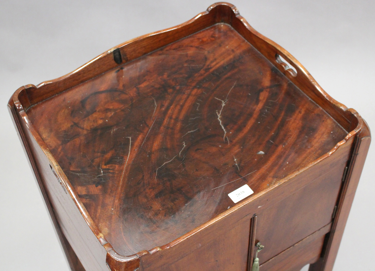 An early 19th century mahogany night cupboard, the galleried top above a pair of doors and a drawer, - Image 2 of 2