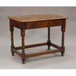 An early 20th century William and Mary style walnut side table, the moulded top above a single