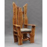 A modern rustic cherry wood throne armchair of naturalistic form, height 160cm, width 80cm, depth