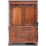 A Victorian mahogany linen press, fitted with a pair of doors above two short and two long