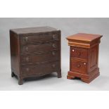 A 20th century reproduction mahogany chest of four drawers, on splayed bracket feet, height 76cm,