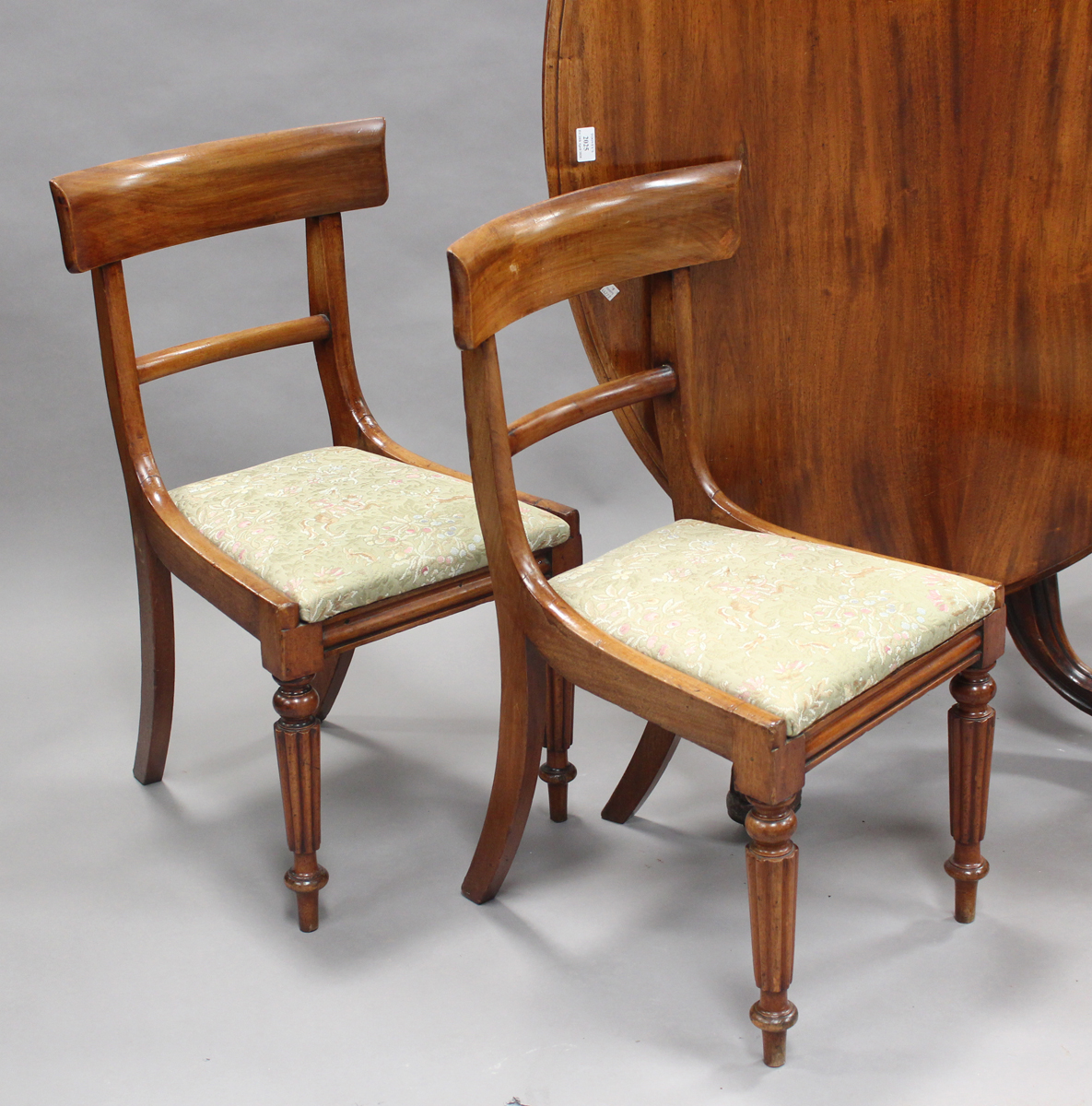 A late Victorian mahogany oval tip-top breakfast table, the turned stem on cabriole legs, height - Image 4 of 4