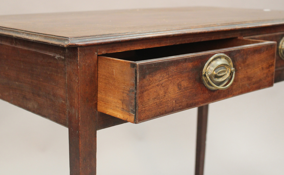 A George III mahogany side table, the moulded top above two frieze drawers, on square tapering legs, - Image 2 of 3