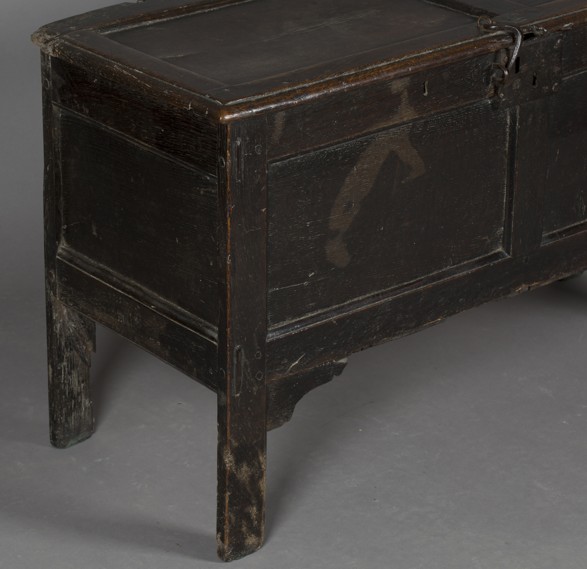 An early 18th century oak panelled coffer, the hinged lid with wrought iron latch, raised on long - Image 5 of 5