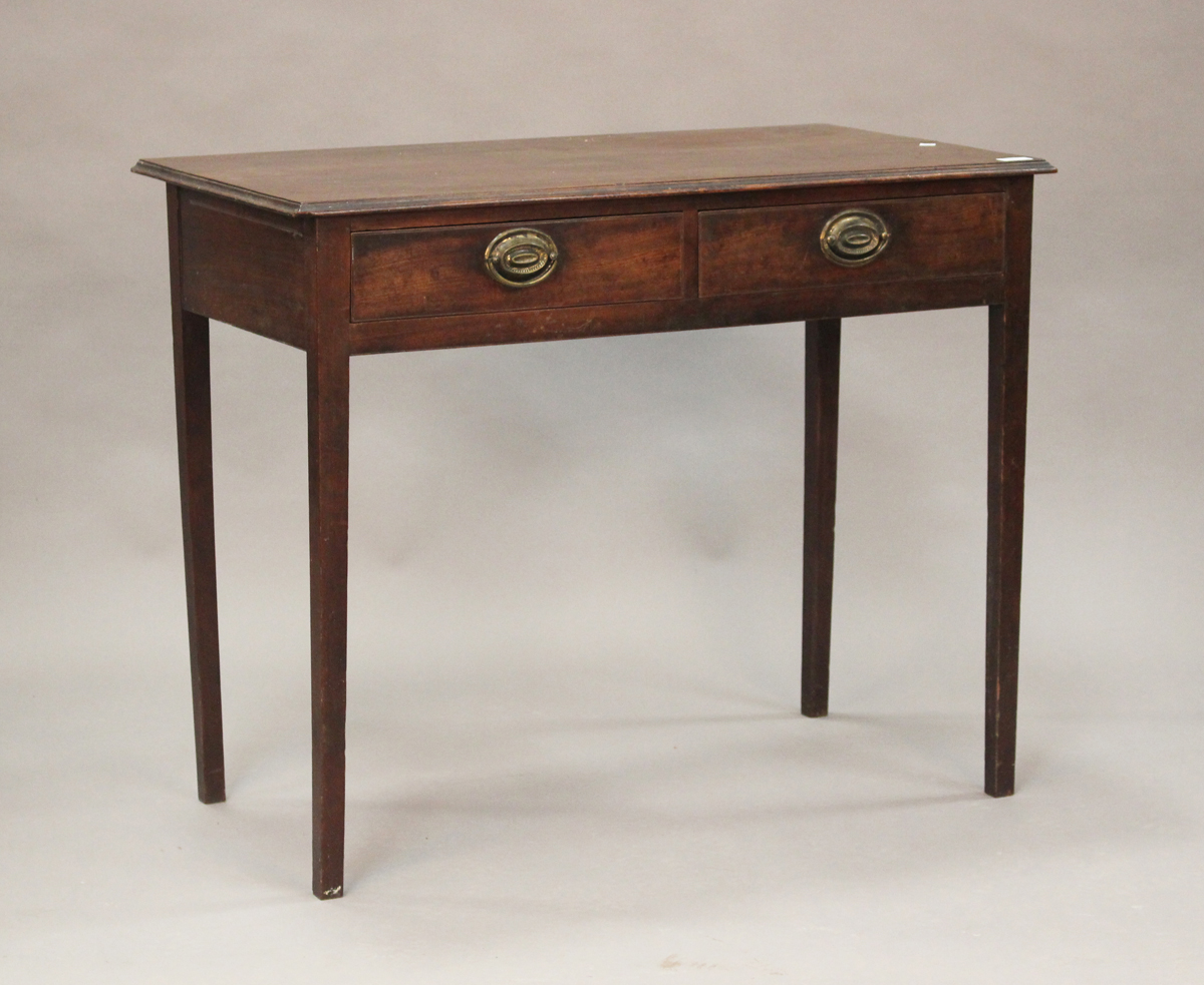 A George III mahogany side table, the moulded top above two frieze drawers, on square tapering legs,