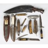 A selection of mainly early 20th century knives, including two folding pocket knives with horn