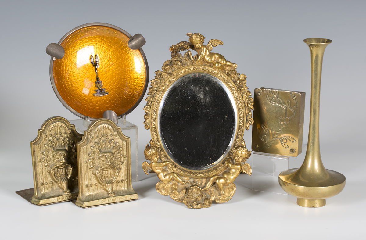 A small group of metalwork, including a late 19th century French ormolu dressing table mirror,