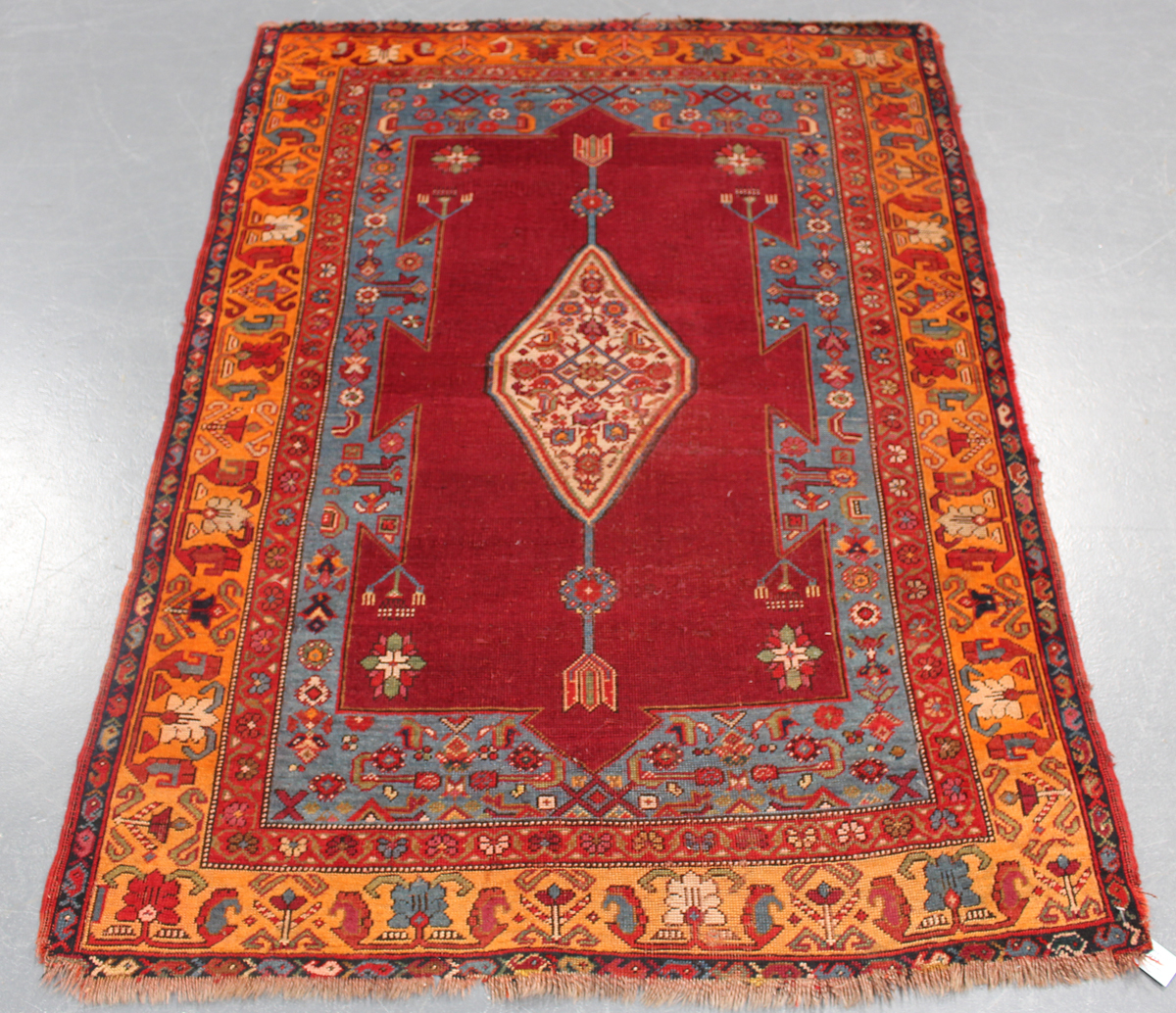 A Garabagh rug, South-east Caucasus, early 20th century, the deep claret field with an ivory