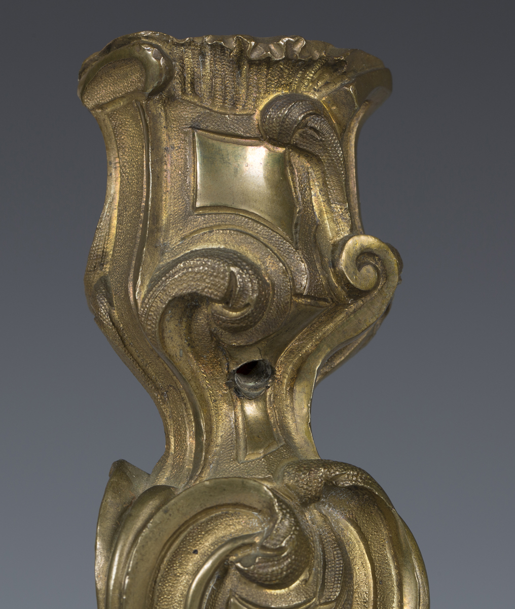 A pair of Rococo gilt bronze candlesticks of foliate scrolling form, height 28cm (lacking sconces). - Image 2 of 3