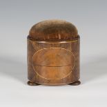 A late George III mahogany cylindrical milliner's hatpin stand, the cushion top above an inlaid