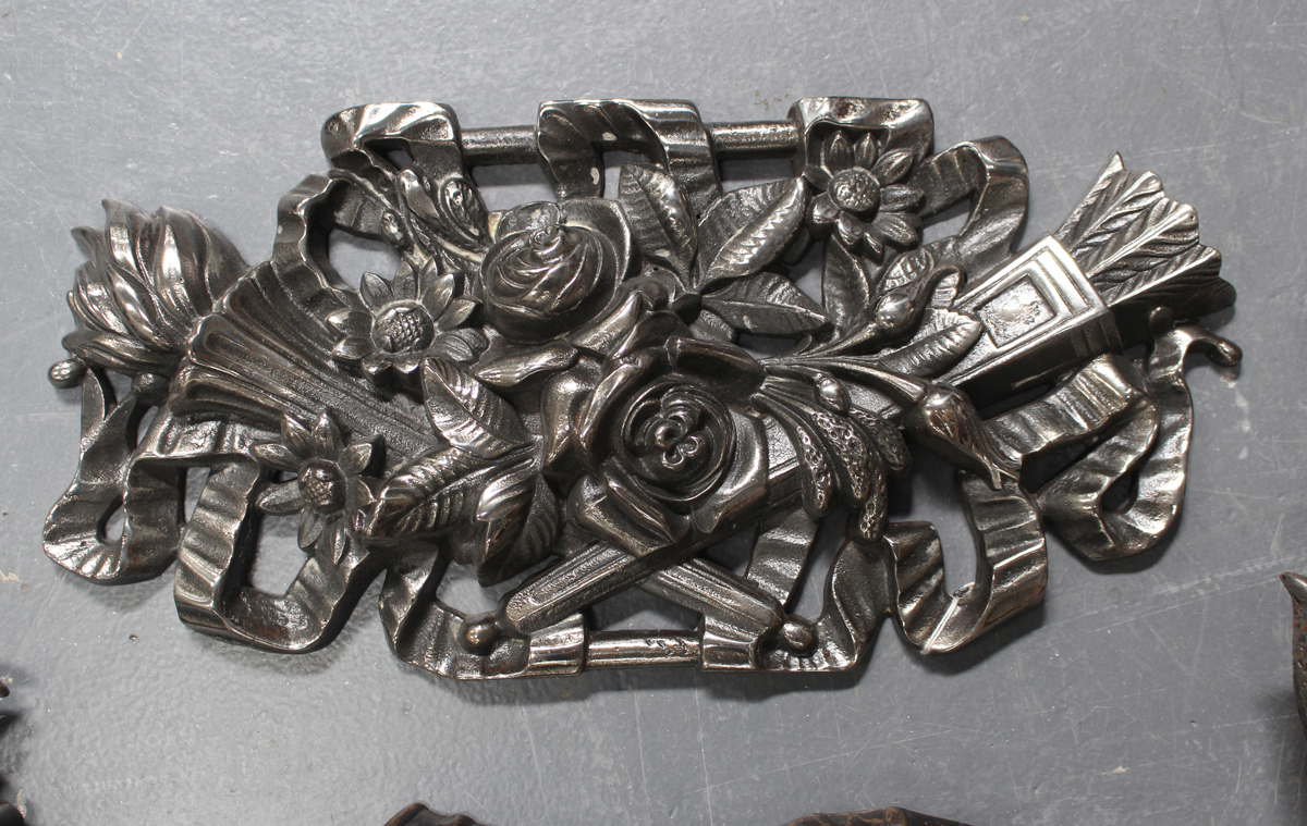 A group of late 19th and early 20th century decorative cast iron and polished steel items, including - Image 2 of 2