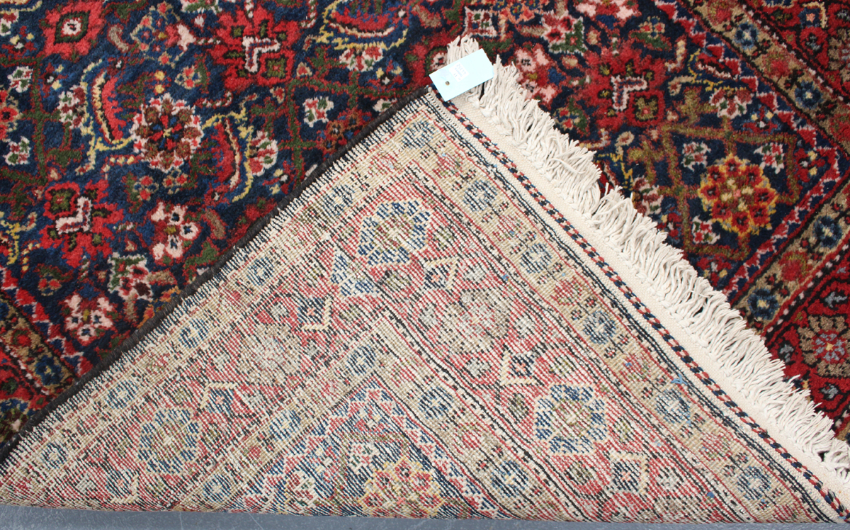 A Hamadan rug, North-west Persia, mid-20th century, the midnight blue field with an overall herati - Image 2 of 3