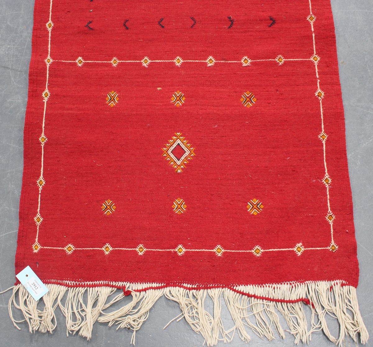 An Afghan kelhim runner, late 20th century, the claret field sparsely decorated with stylized - Image 3 of 4