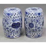 A pair of modern Chinese blue and white porcelain barrel-shaped garden seats, decorated with overall