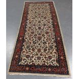 A Tabriz runner, Central Persia, mid/late 20th century, the ivory field with overall scrolling