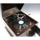 An HMV model 103 oak cased table-top gramophone with No. 4 sound box and bearing Harrods retail
