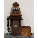 An early 20th century Swedish wall mounted telephone by L.M. Ericsson, height 66cm, together with