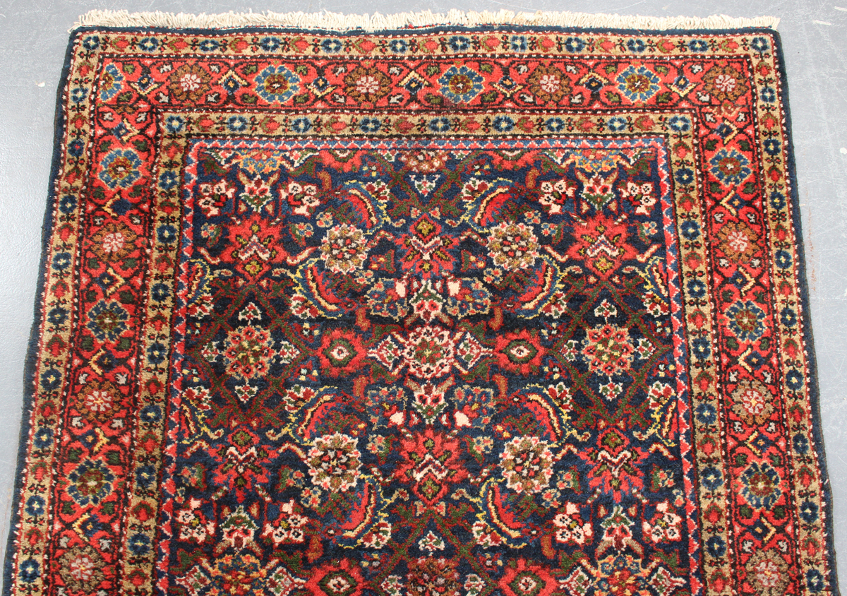 A Hamadan rug, North-west Persia, mid-20th century, the midnight blue field with an overall herati - Image 3 of 3
