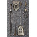 A pair of Victorian steel and brass handled fire tools, comprising shovel and tongs, length 76cm,