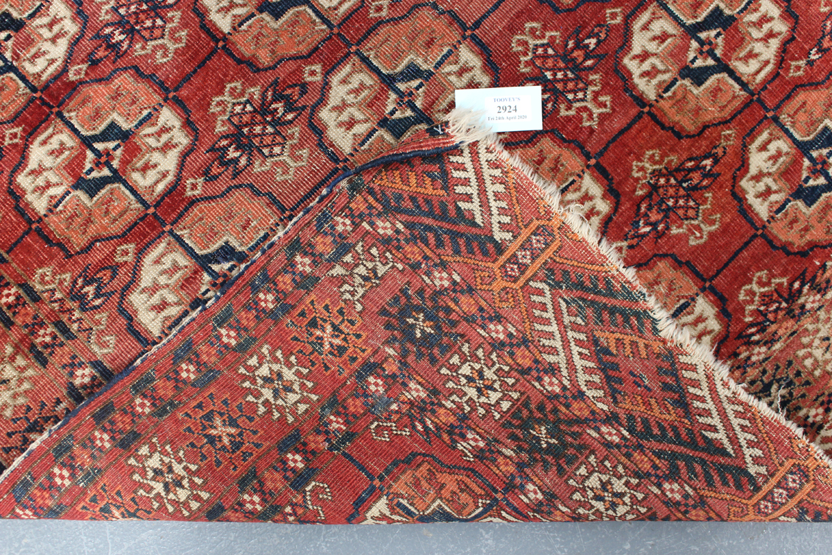 A small Tekke rug, West Turkestan, early 20th century, the claret field with three columns of - Image 2 of 3