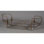 An early 20th century French wrought iron child's two-seat swingboat, length 131cm (lacking swing