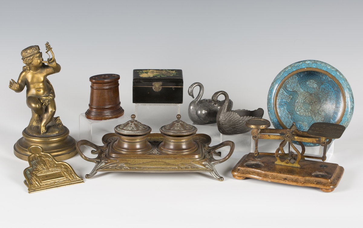 An Edwardian brass two-handled inkstand decorated with mistletoe, width 27cm, a gilt metal table