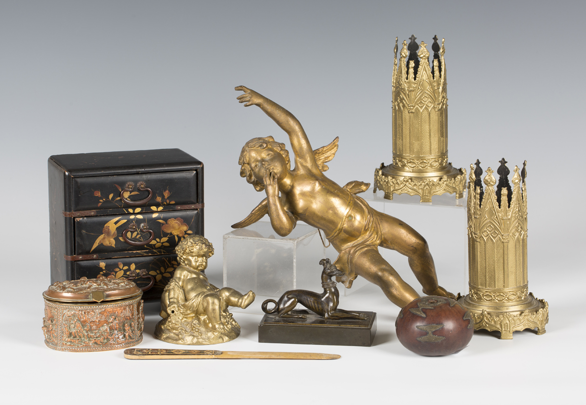 A small group of collectors' items, including a 19th century bronze model of a recumbent whippet,