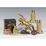 A small group of collectors' items, including a 19th century bronze model of a recumbent whippet,