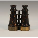 A pair of 19th century tortoiseshell and brass mounted binoculars by 'A. Chevalier', width 13cm,