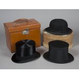 A black silk top hat by Henry Heath Limited, London, initialled 'GM' to interior, head aperture 20.