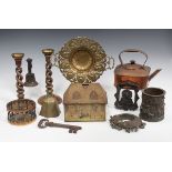 A group of metalwork and collectors' items, including a pair of oak barley twist candlesticks, a