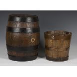 A late 19th/early 20th century oak coopered barrel, height 41cm, together with an oak coopered